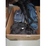 A selection of home movie video cameras and cased tripods