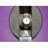 A lady's gold plated wrist watch by Citizen having diamante set dial to mother of pearl face on a