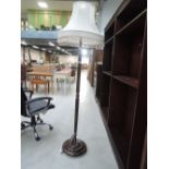 A traditional mahogany standard lamp