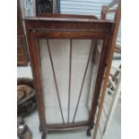 An early 20th Century oak display cabinet