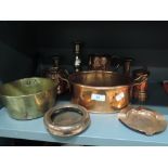 A selection of copper wares including fish steamer tankard and heavy set brass candle sticks