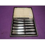A cased set of silver handled butter knives, Birmingham 1927, William Deakin