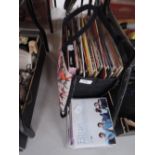 A selection of 33rpm vinyl records and similar compact CD's