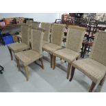 A set of eight seagrass chairs