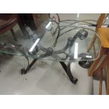 A metal and glass coffee table