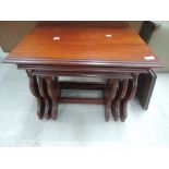 A modern mahogany effect nest of tables