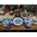 A selection of tea cups and saucers including Tuscan