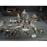 A selection of plated figures and fiurines