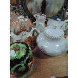 A selection of teapots and jugs including Poole