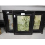 A selection of antique picture frames and prints