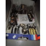 A selection of cutlery flatware and table wares