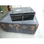 A vintage travel trunk and deed style box