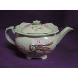 A hand painted tea pot by Grimwades