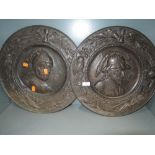 A pair of Spanish styled pressed copper plaques of conquistador