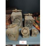 A set of cast pound kitchen scale weights