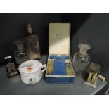 A selection of medical related items including etched bottles