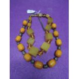 Two amber style necklaces