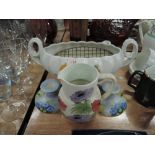 A selection of hand decorated ceramics by Radford
