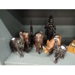 A selection of hand carved African animals including elephants