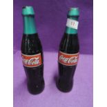 A pair of metal cast Coca Cola advertising door handles