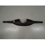 An antique Dutch style farm or dairy shoulder yoke