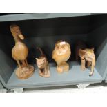 A selection of wooden hand carved animal figures