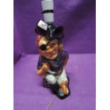 A ceramic figural table lamp in the form of a pirate