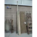 A selection of wooden doors, shutters and rails