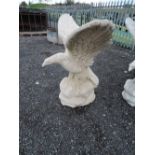 A large concrete eagle statue