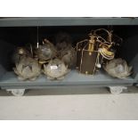 A selection of Capiz shell lotus flower style light shades and two brass effect lantern style