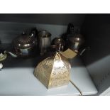 A selection of plated wares and brass filigree light shade