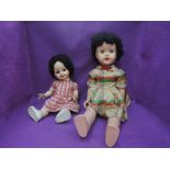 A mid 20th century Cinderella No3 celluloid doll having sleep eyes, open mouth and jointed body