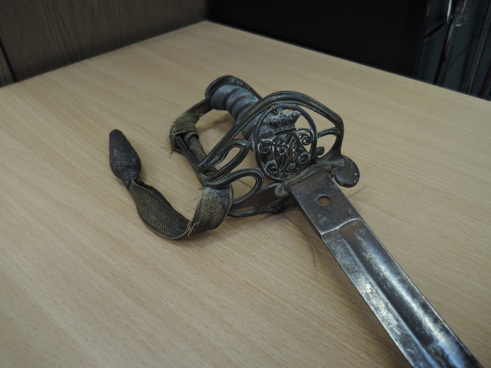 A possible British Infantry Officer's sword, 1860 with engraved blade, no scabbard, with original