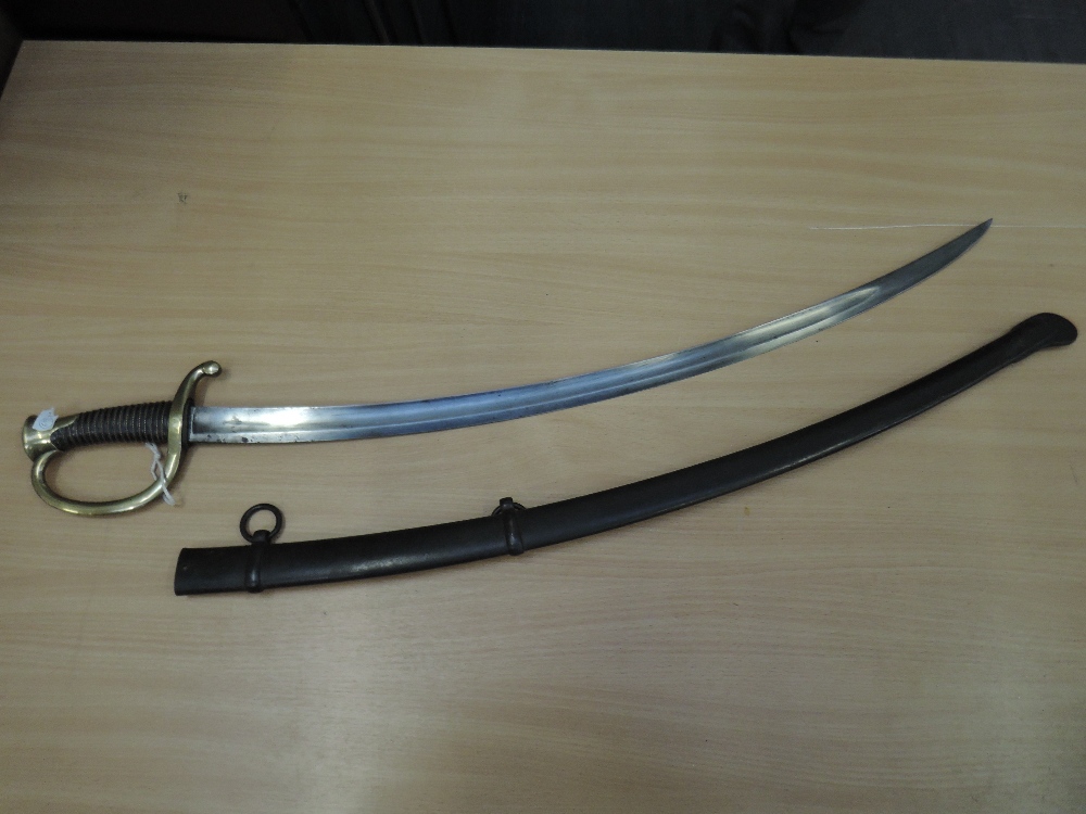 A French 1929 model mounted Artillery sword with metal scabbard, in very good condition