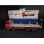 A Dinky Supertoys diecast, Foden Flat Truck with Chains having red cab and chassis, grey bed with