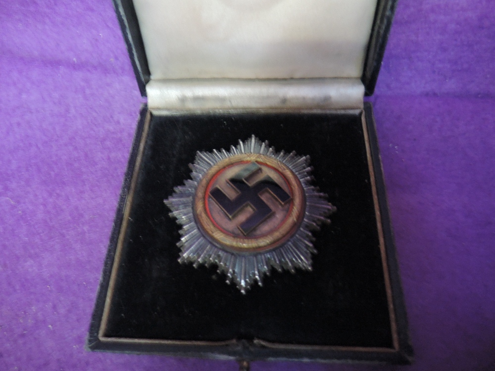 A German World War II cross in gold, named to Oberlieutenant Heinz Shimt 6/JG52 20/8/42, maker