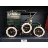 A tin plate Model T having JB Balloon-Tyres and advertising decal, R K Backham Flookburgh Tel 298,