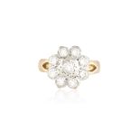 A DIAMOND CLUSTER RING, set throughout with round brilliant-cut diamonds, mounted in 18K gold,