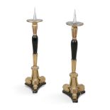A PAIR OF GILT WOOD AND EBONISED 'PRICKET' CANDLESTICKS, with stiff leaf decoration on inscrolling