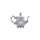 AN EDWARDIAN SILVER TEAPOT, Birmingham 1908, mark of W. G Keight Sons & Co., of baluster shape