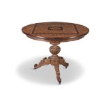 AN OAK AND PARQUETRY INLAID TILT TOP CICRCULAR TABLE, 19th Century of circular form, centred with