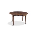 A 19TH CENTURY MAHOGANY OVAL DOUBLE DROP LEAF TABLE, with moulded rim and raised on plain turned