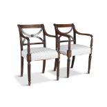 A PAIR OF IRISH REGENCY MAHOGANY OPEN ARMCHAIRS, each with cross-framed splat and reeded down