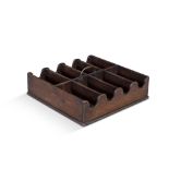 A GEORGIAN MAHOGANY BOTTLE CARRIER, of squared shape with eight compartments notched to each end and