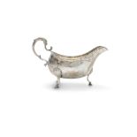 A GEORGE III IRISH SILVER SAUCE BOAT, Dublin c.1775, mark of Matthew West, the plain body with