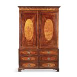 A GEORGE III INLAID MAHOGANY LINEN PRESS, the moulded cornice above twin fielded panel doors, on a