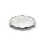 AN EDWARDIAN IRISH SILVER SALVER, Dublin 1907, mark of West & Son, with pie crust rim and raised