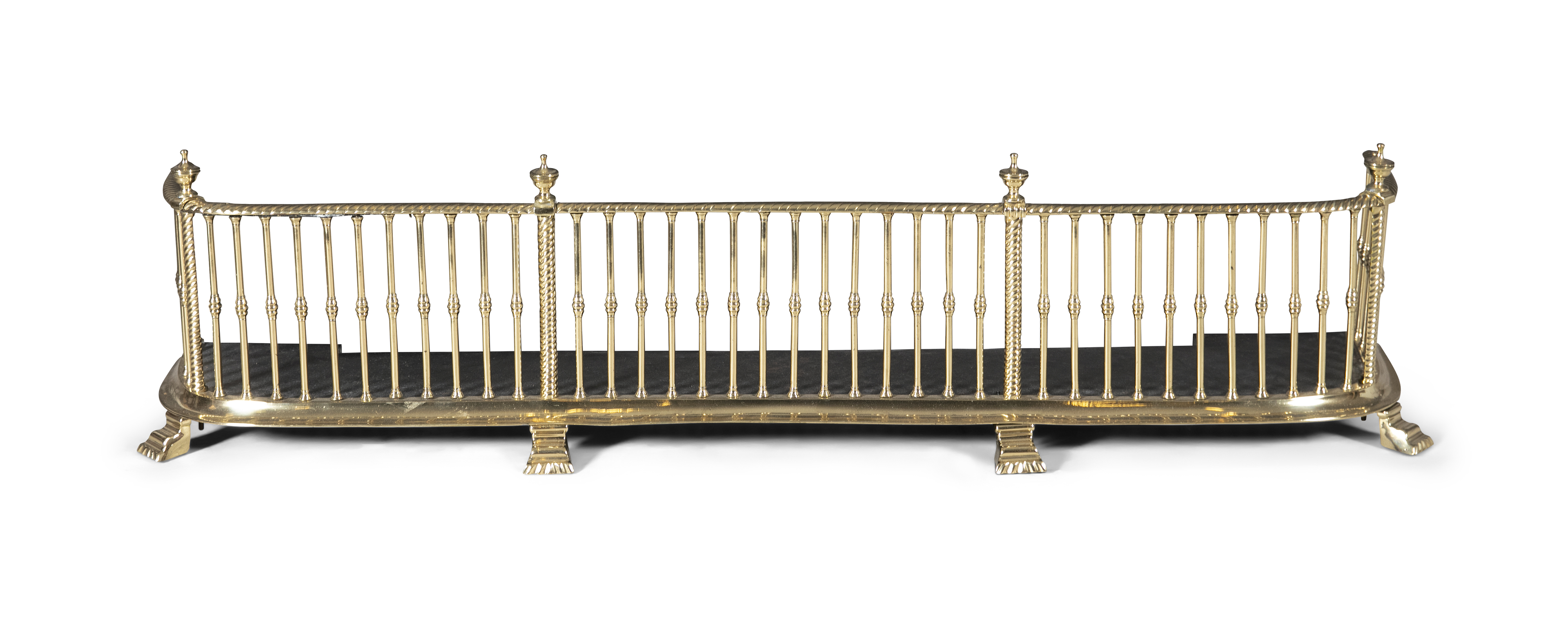 A TALL GEORGE III STYLE BRASS FENDER, 19th Century, the rope twist top rail surmounted by urn