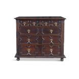 A 17TH CENTURY CHEST OF DRAWERS, of rectangular shape with two short and three long graduated
