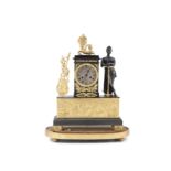 A FRENCH GILT METAL MANTLE CLOCK, 19th century, of upright rectangular form, surmounted with a